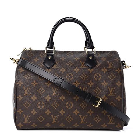 lv speedy with black leather.